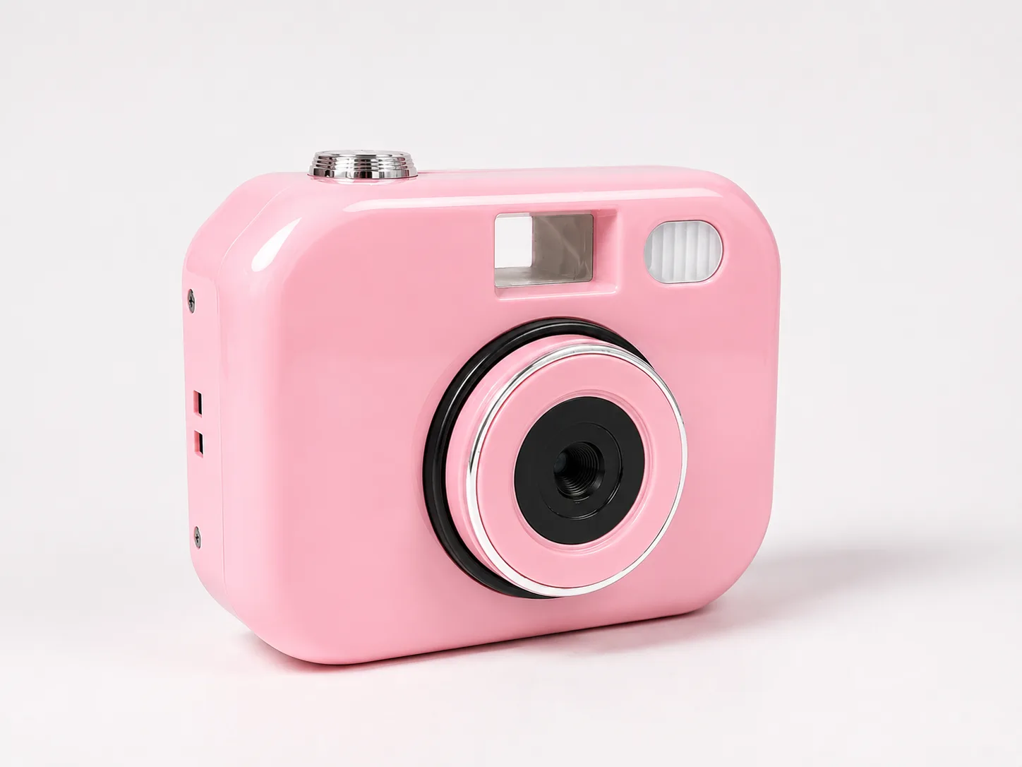 VHSMO Camera in Baby Pink, three-quarter side view