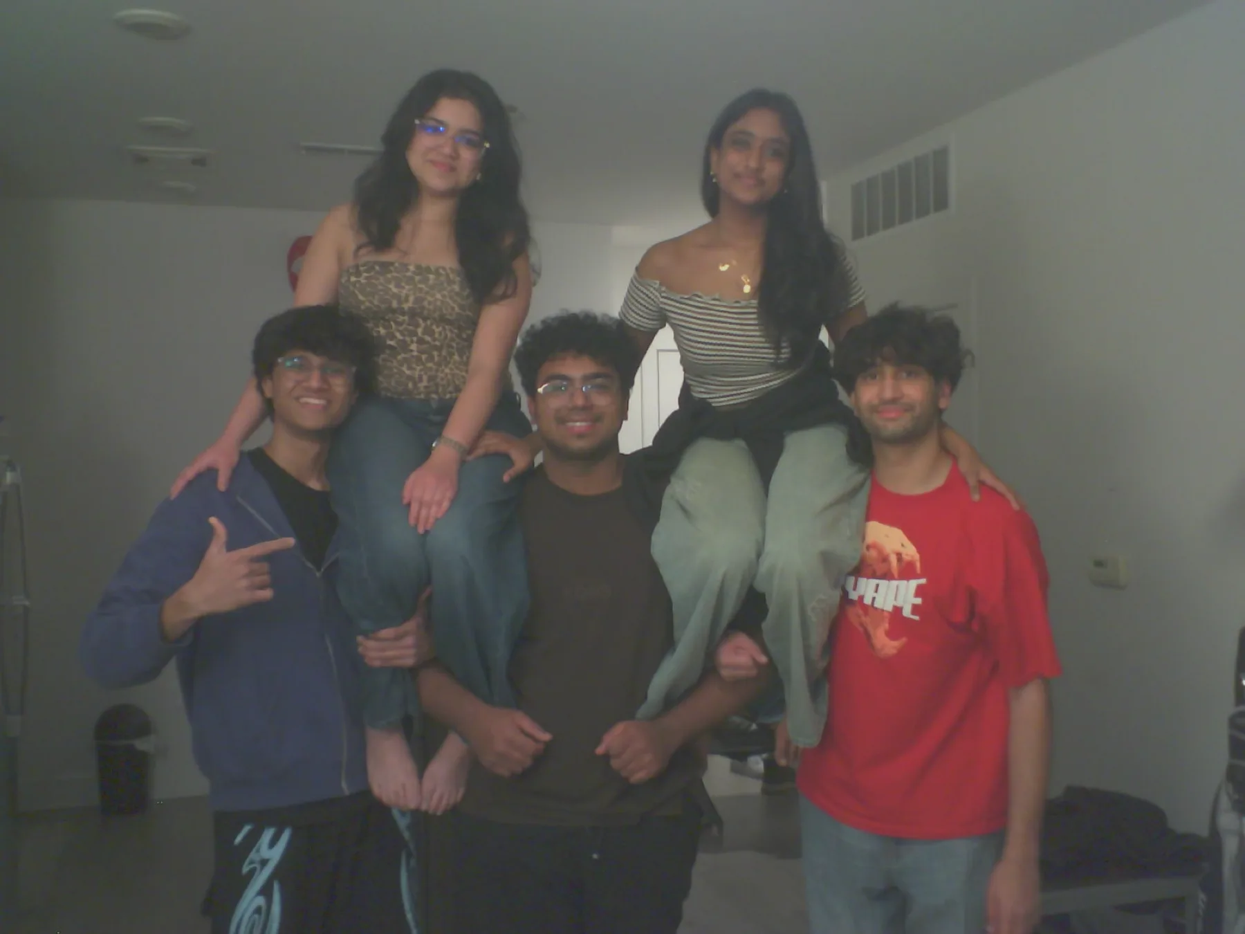 Friends piled together at night, shot on VHSMO Prototype Version 3.1